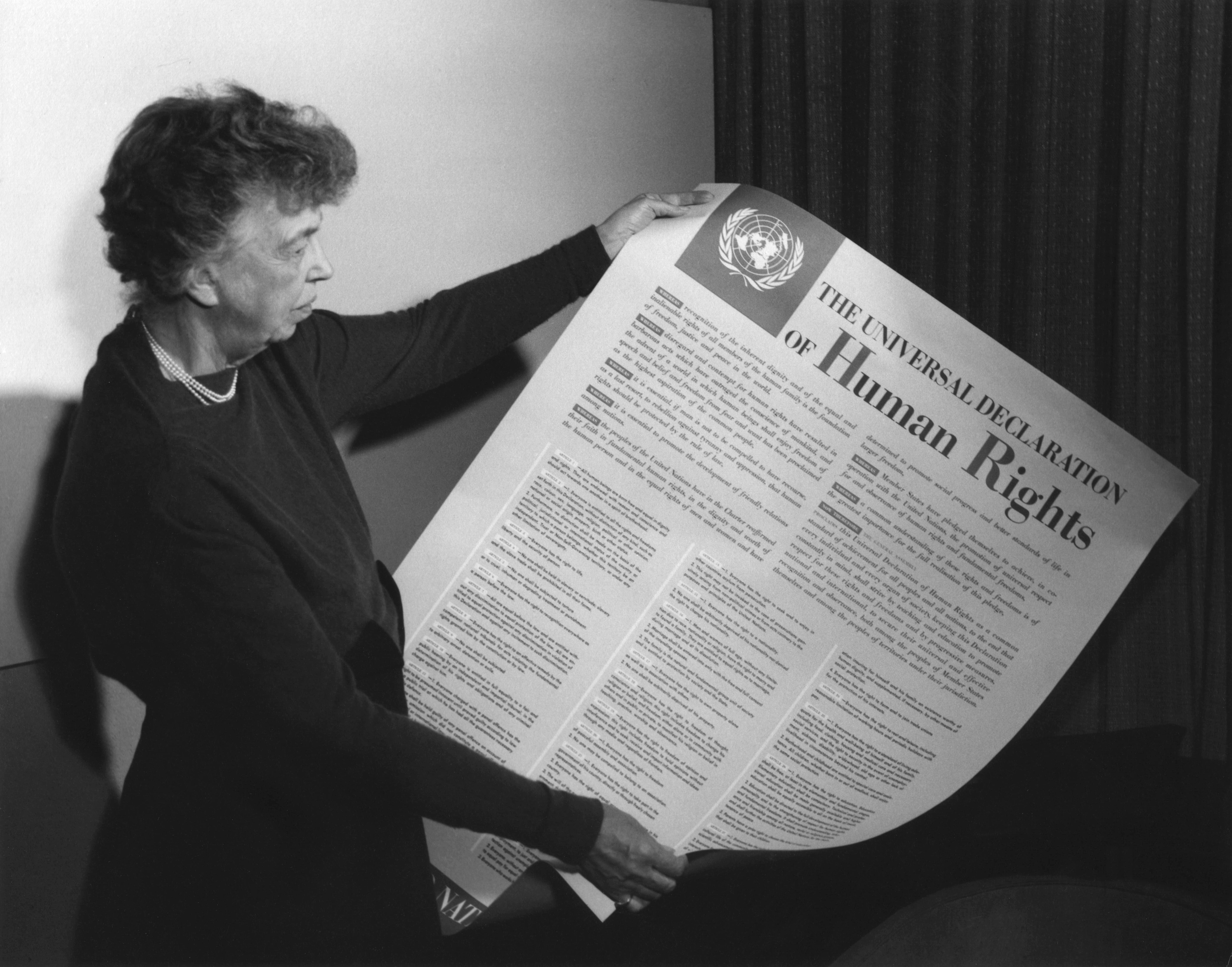 Eleanor Roosevelt holding the Universal Declaration of Human Rights document
